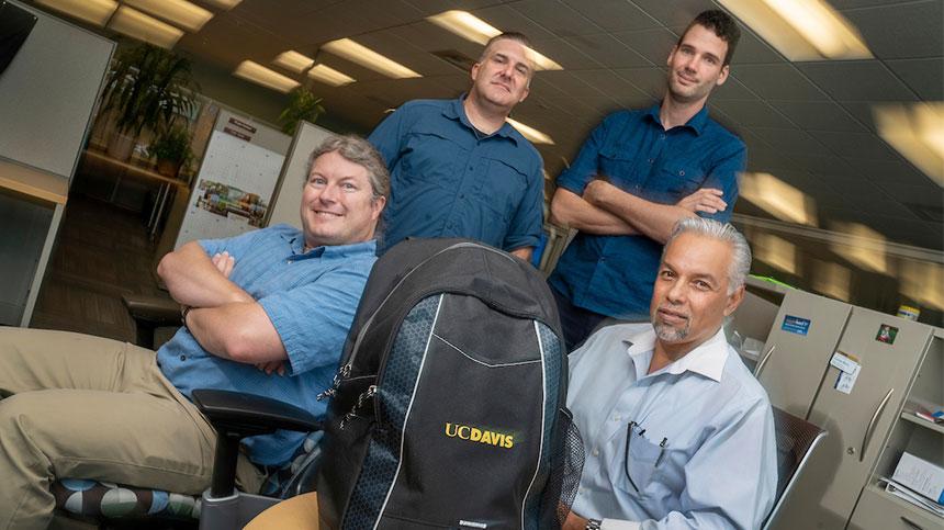 Among those who worked on the technology for Article 26 Backpack are, from left to right, Shawn DeArmond, web architect; web developers Carson Black and Jeroen Post; and project manager Erie Comer.