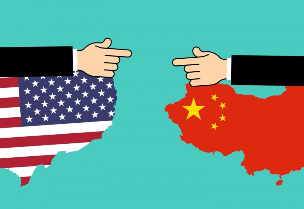 Illustration of the United States and Russia pointing fingers at one another