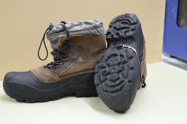 The fire-retardant triboelectric nanogenerator mounted on a work boot.