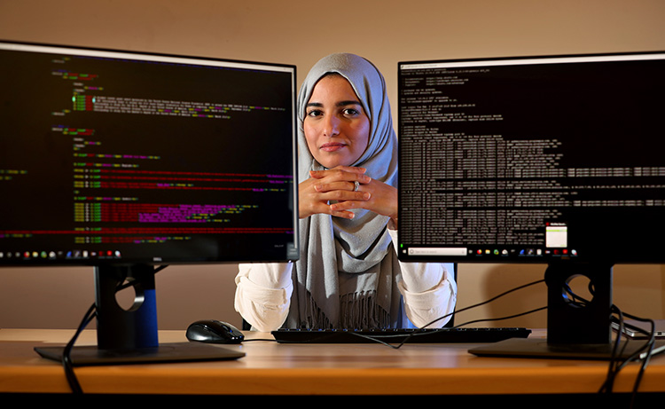 Portrait of PhD candidate Fatemah Alharbi, with UCR's Computer Science and Engineering Department, on March 20, 2019. Alharbi recently made headlines after Apple Inc. acknowledged her for helping discover a flaw in their security system. (UCR/Stan Lim)