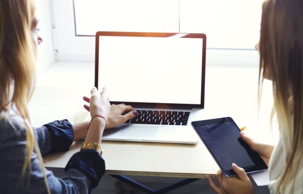 Two women at a computer