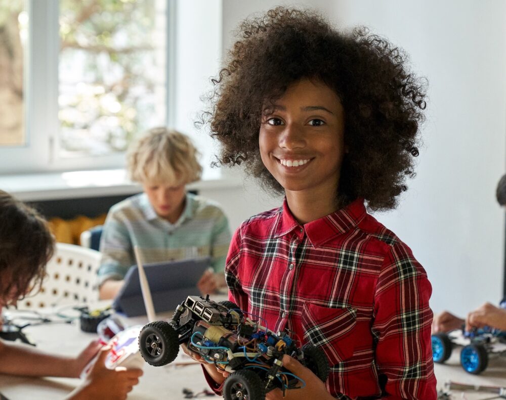 Girl with robot toy