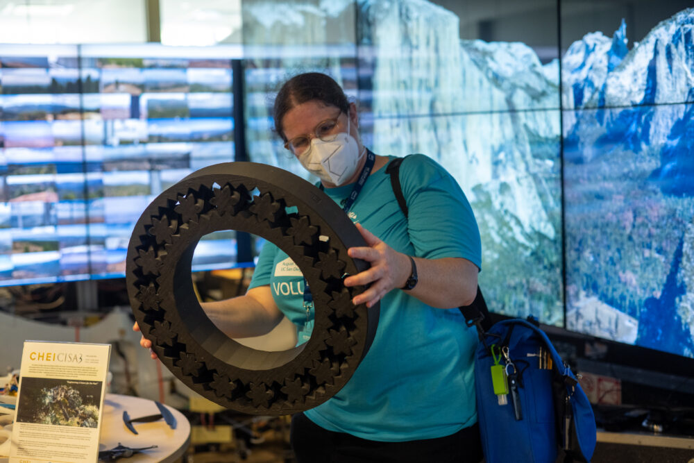 woman observing a device