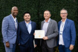 Bruce Miller accepting the Sustained Impact Award at the UC Tech Awards Ceremony in 2023 with Van Williams, Joe Bengfort and Gabe Gonzales