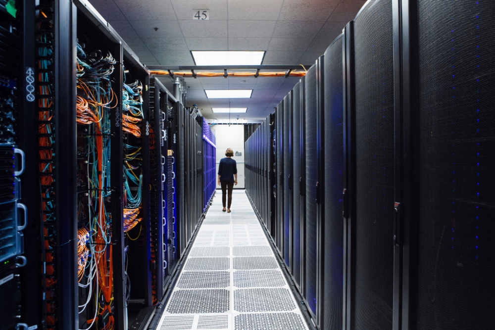 Woman in server room (c) University of California
