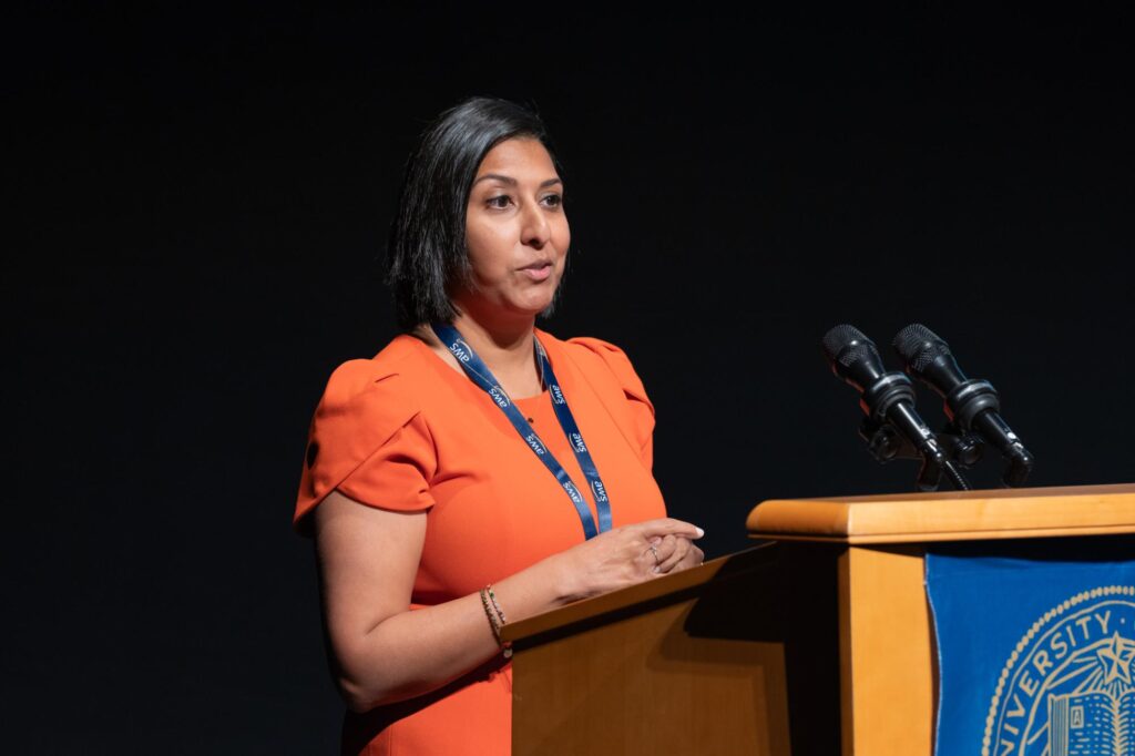 Azra Ayers at podium