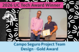 Campo Seguro Project Team member, Yajaira Ramirez Sigala, holds the Gold Design Award certificate and poses for a photo with UC Merced CIO Nick Dugan.