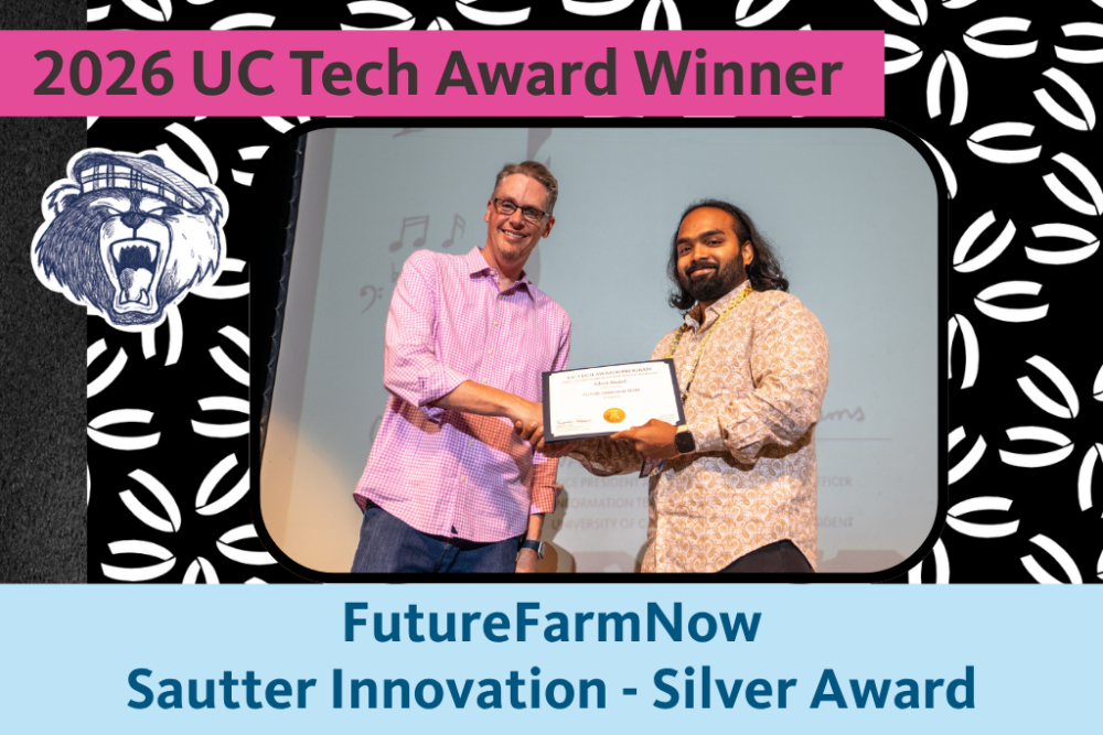 FutureFarmNow team representative, Suryaa Charan Shivakumar, holds the Silver Larry L. Sautter for Innovation in IT Award certificate and poses for a photo with UC Merced CIO Nick Dugan.